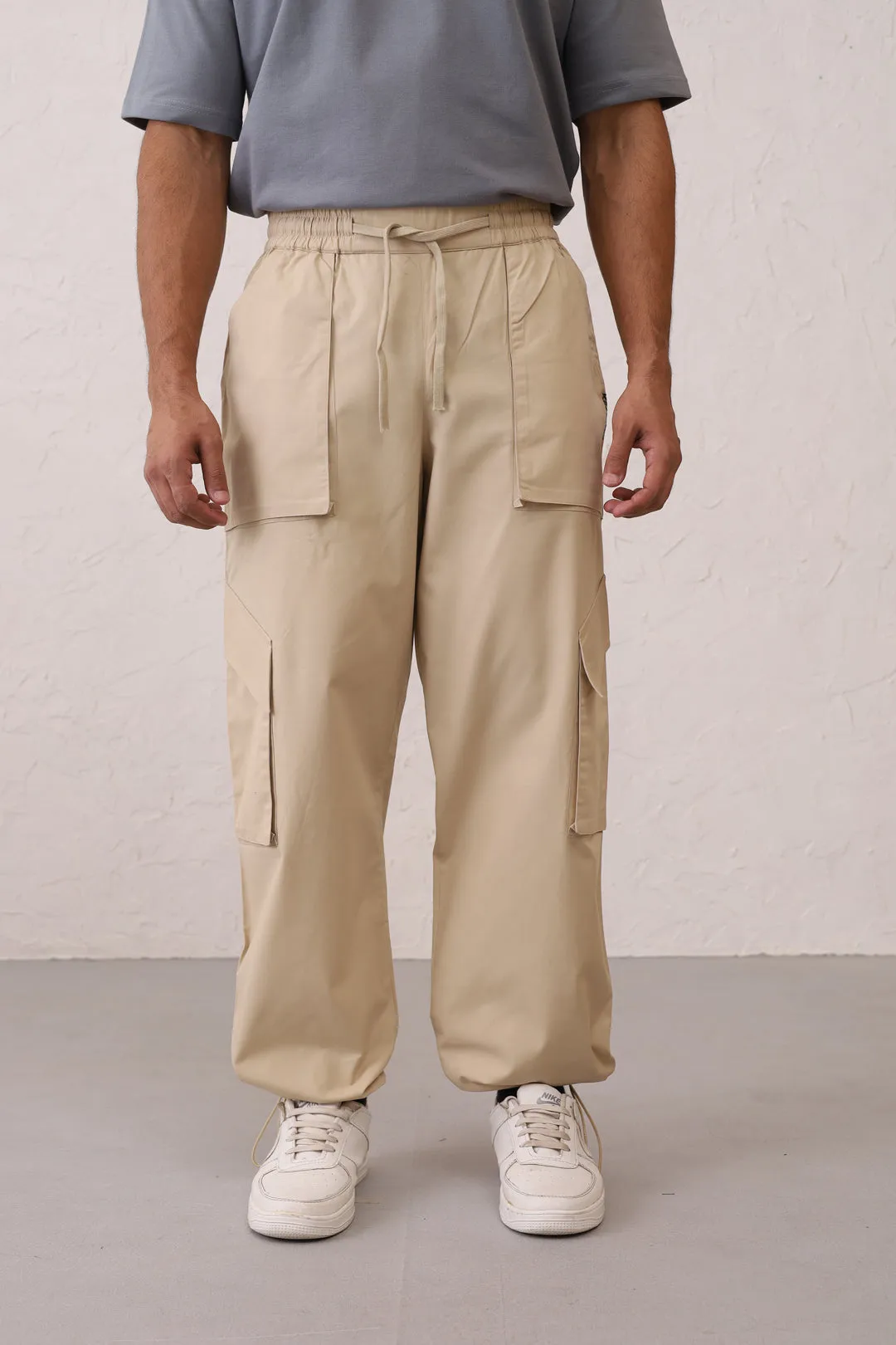NOMAD Beige Parachute Pants