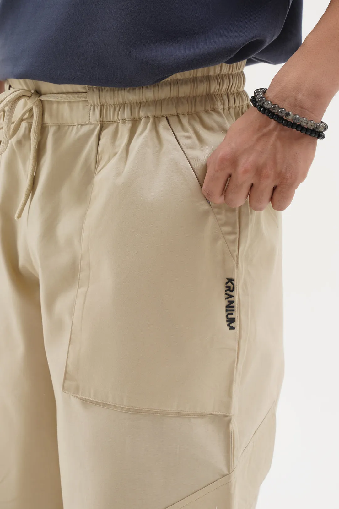 NOMAD Beige Parachute Pants