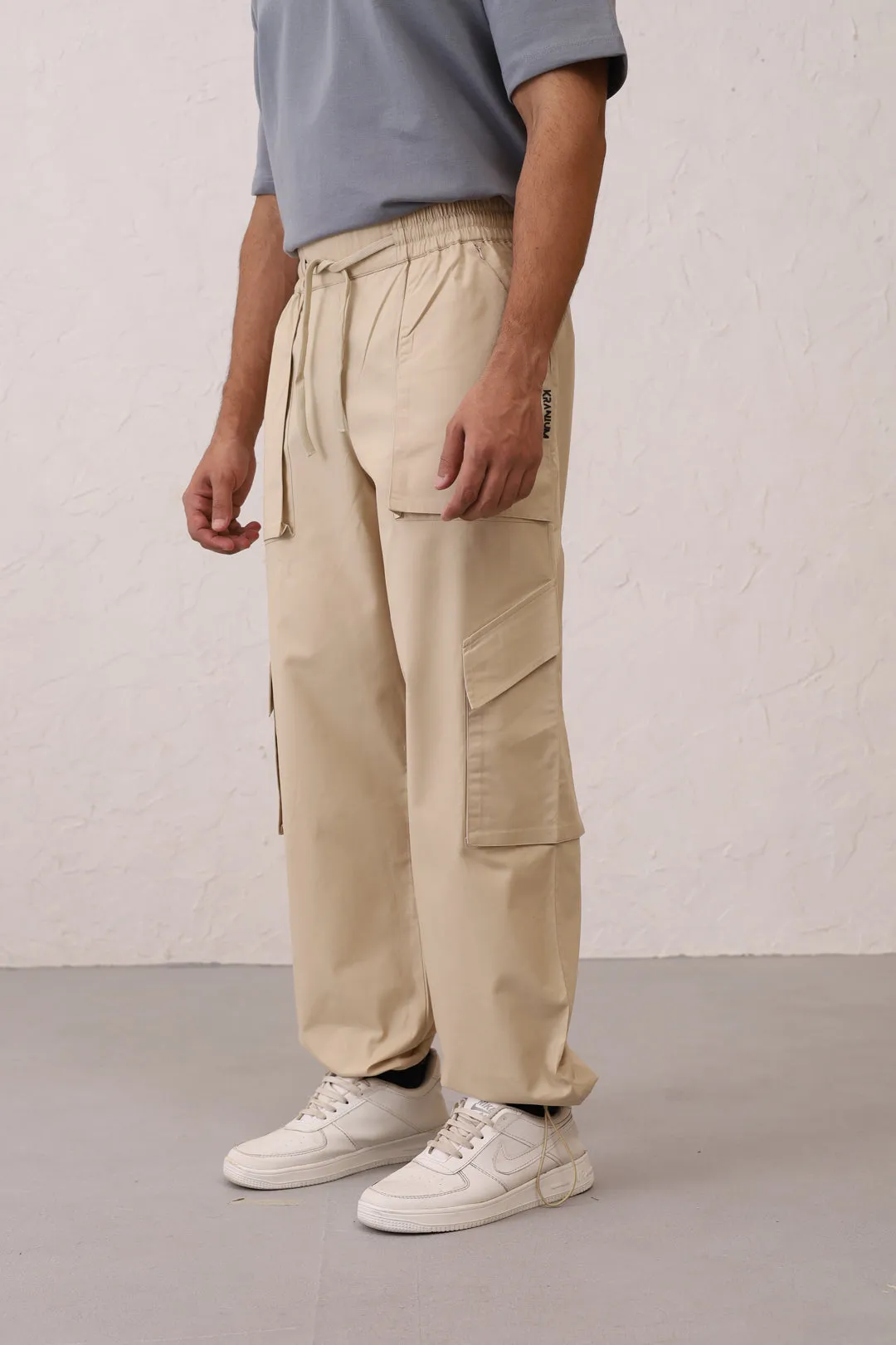 NOMAD Beige Parachute Pants