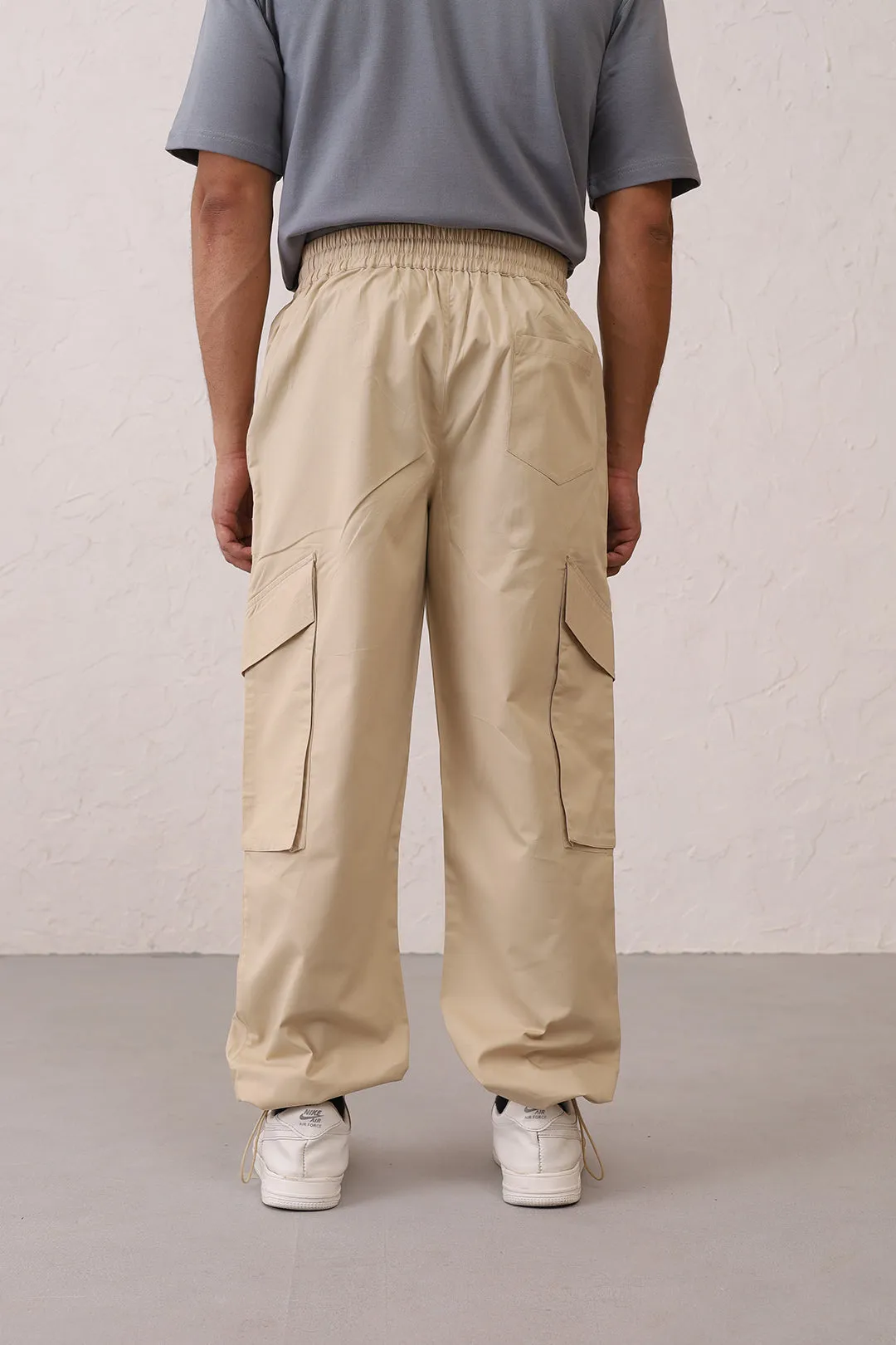 NOMAD Beige Parachute Pants