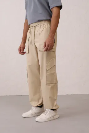 NOMAD Beige Parachute Pants